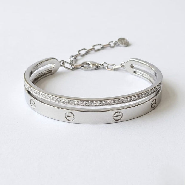 platinum plated bracelet with dual Line Screw and CZ