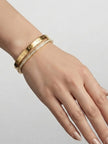 Gold plated bracelet with dual Line Screw and CZ