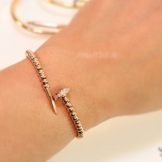 Rose gold plated cz and metallic bead nail bracelet-openable