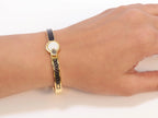 Half textured gold & black band