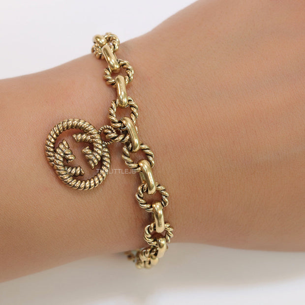 Fancy link chain antique gold finish bracelet with double G motif