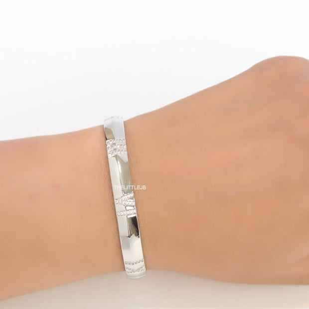 Platinum plated bracelet with cz roman numerals