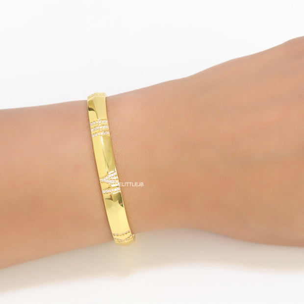 Gold bracelet with cz roman numerals