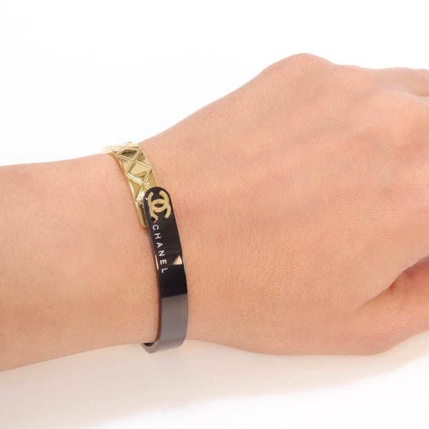 Half n Half gold black cross band style bracelet
