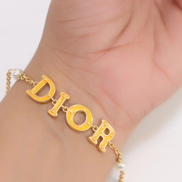 Alphabet bracelet with gold plated chain