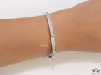 Platinum plated openable bracelet studded with cz