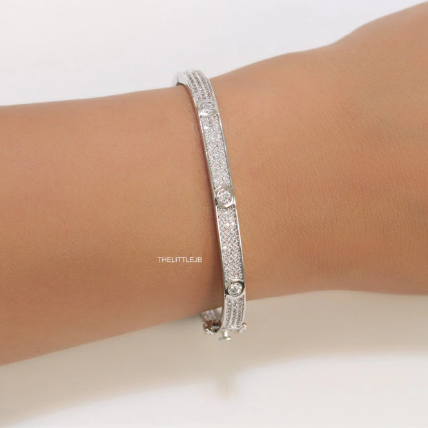 Platinum plated openable bracelet studded with cz