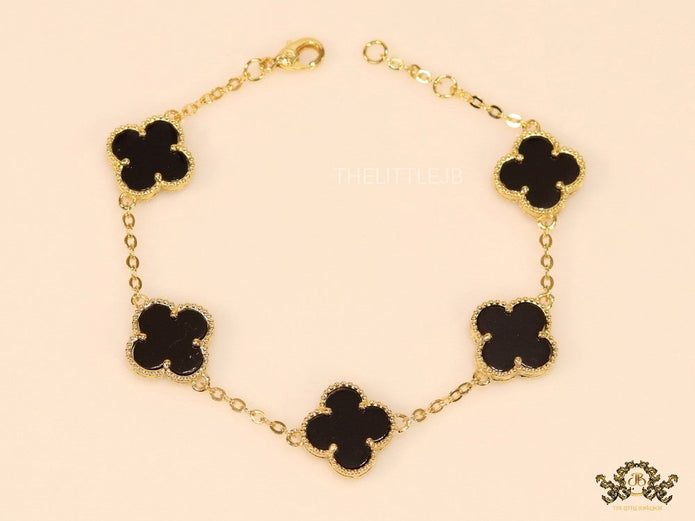 Gold plated chain bracelet with black clover