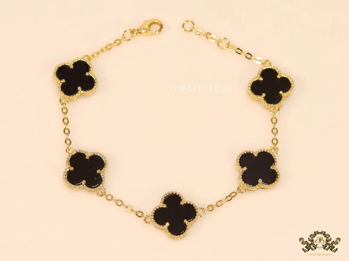 Gold plated chain bracelet with black clover
