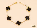 Gold plated chain bracelet with black clover