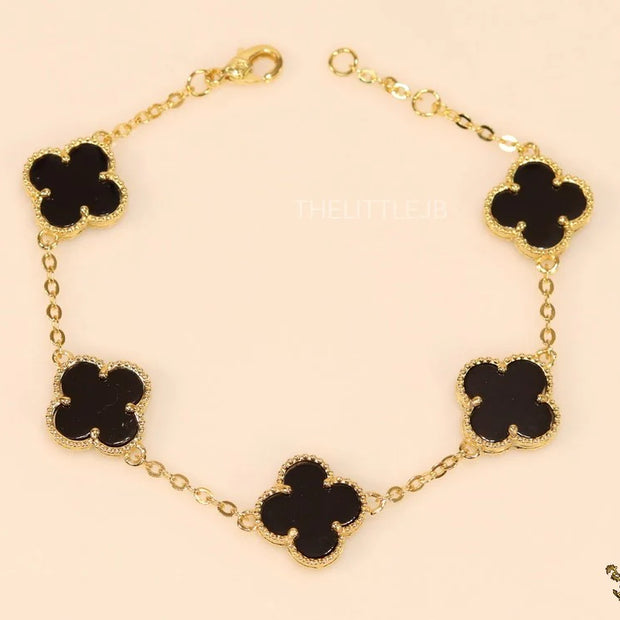 Gold plated chain bracelet with black clover