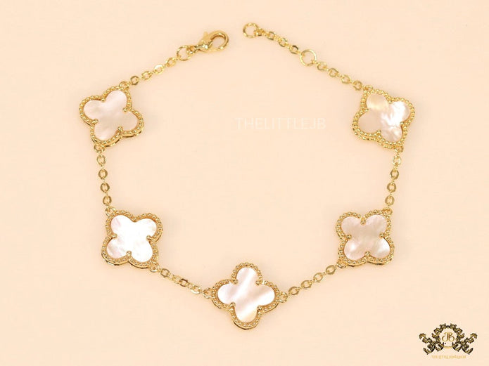 Gold plated chain bracelet with mother of pearl clover
