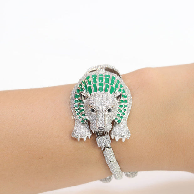 Platinum plated unique panther bracelet with cz and emerald green stones