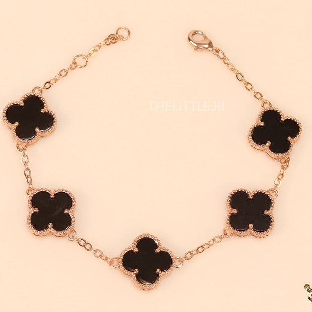 Rose gold plated chain bracelet with black clover