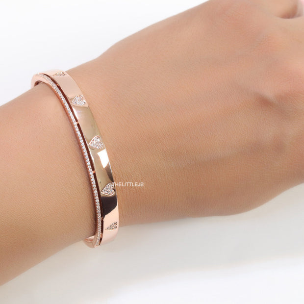 Rose gold bracelet with cz hearts and single line cz
