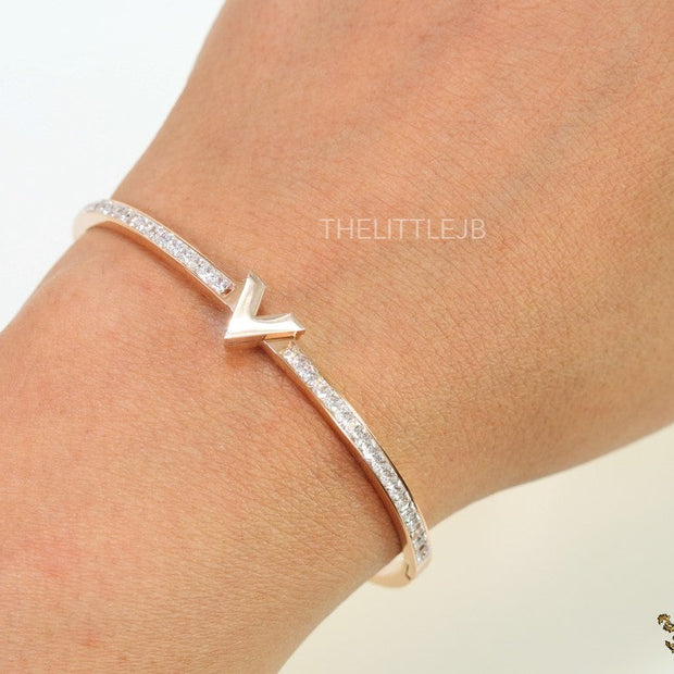Alphabet V motif rose gold plated cz bracelet
