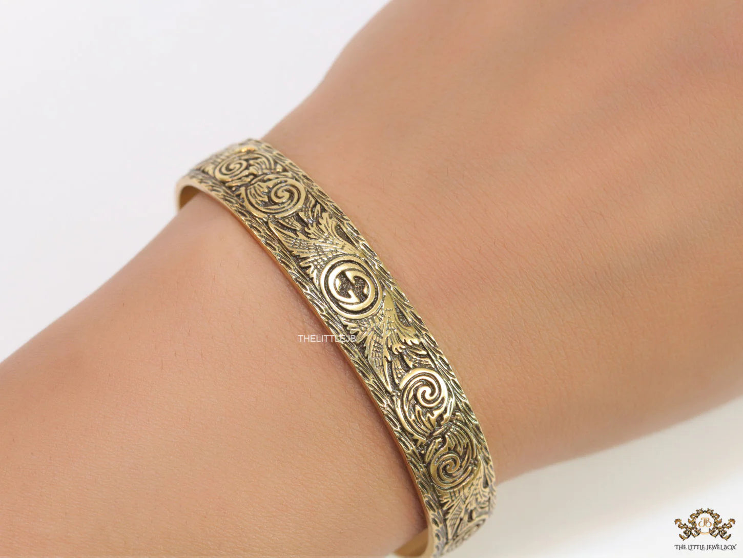 Embossed bracelet band in antique gold finish