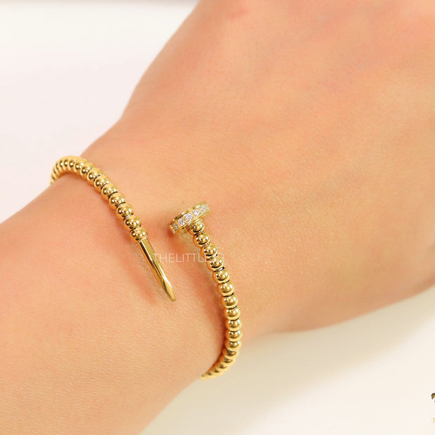 Gold plated openable nail bracelet with cz and metallic beads