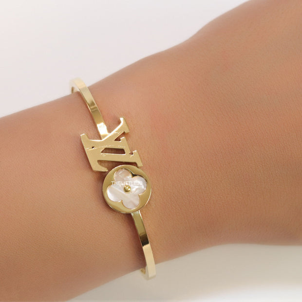 Gold plated alphabet bracelet with MOP clover