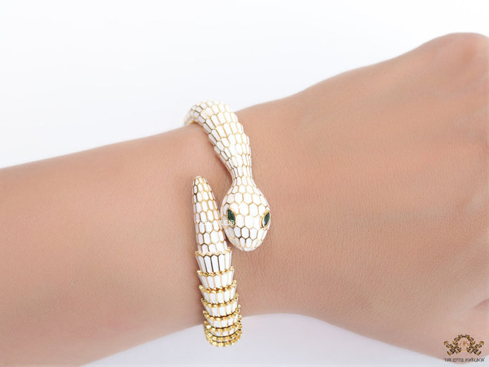 Serpentine open bracelet in white enamel and golden finish