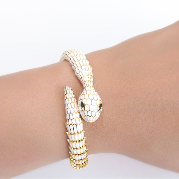 Serpentine open bracelet in white enamel and golden finish