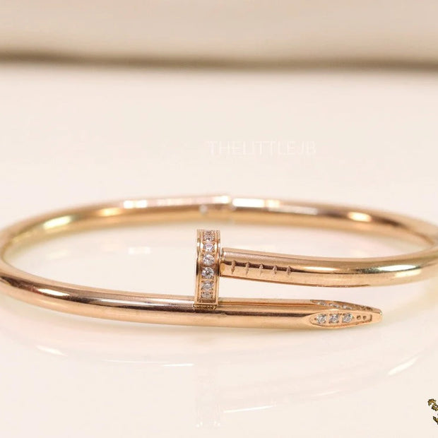 Rose gold plated nail bracelet with cz