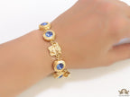 Designer golden Medusa chain bracelet with fancy cut cz