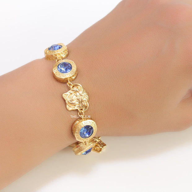 Designer golden Medusa chain bracelet with fancy cut cz