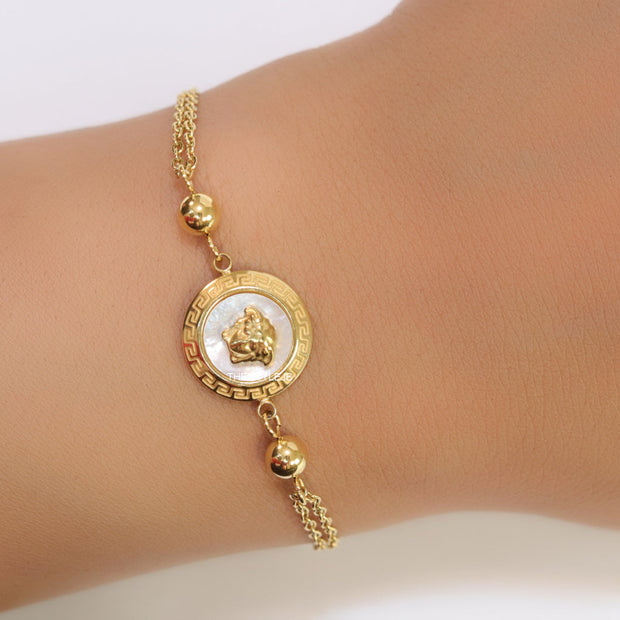 Double chain Medusa bracelet in gold