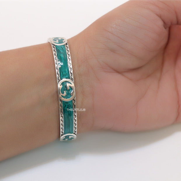 Twin G motif malachite green bracelet in matt gold finish