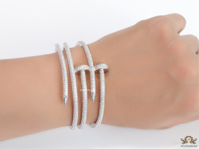 Platinum plated twin nail bracelet with cz