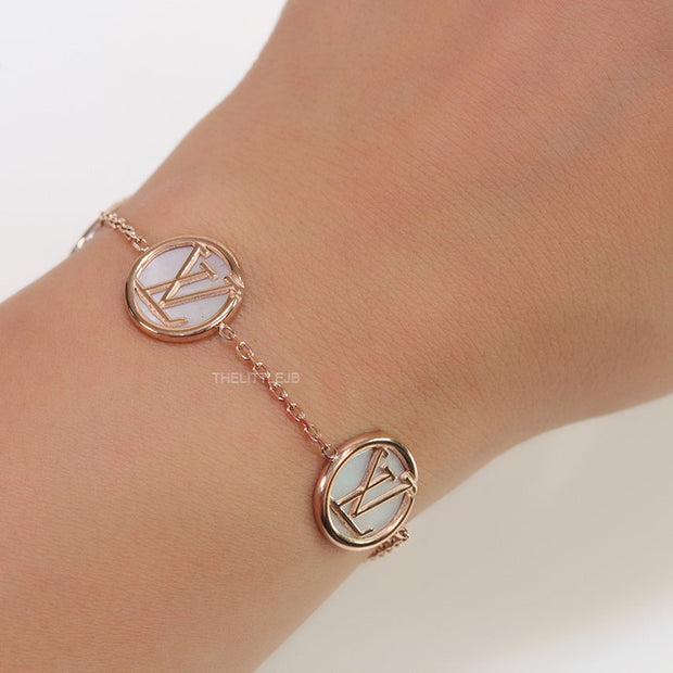 Rose gold plated sleek chain bracelet with MOP discs