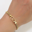 Gold plated watch strap bracelet with V motif