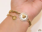 Golden link chain bracelet with Medusa motif centre