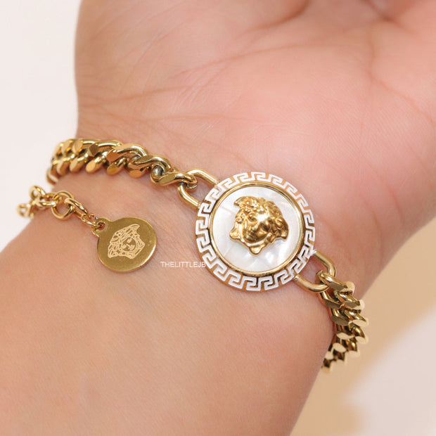 Golden link chain bracelet with Medusa motif centre