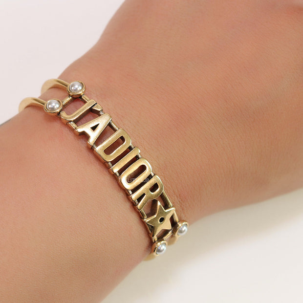 Open Gold plated bracelet with letters