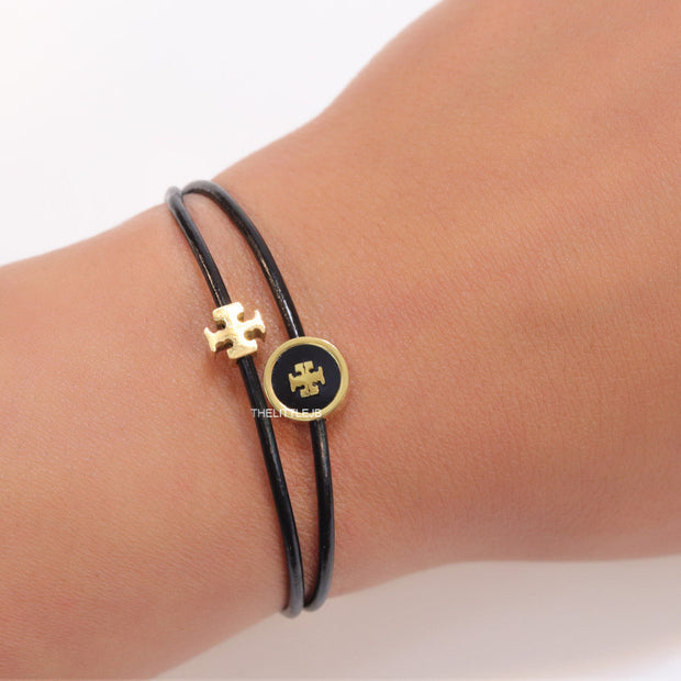 Adjustable double string black bracelet with twin T motifs