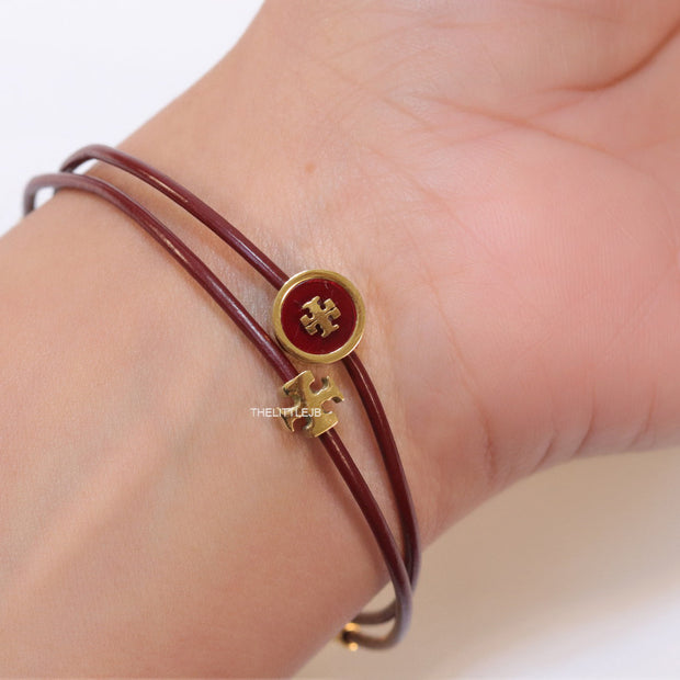 Adjustable double string maroon bracelet with twin T motifs