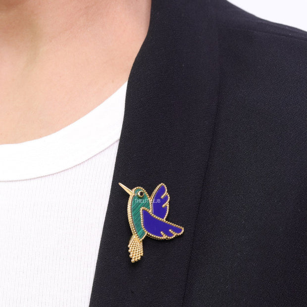 Gold plated multi-colour flying bird brooch