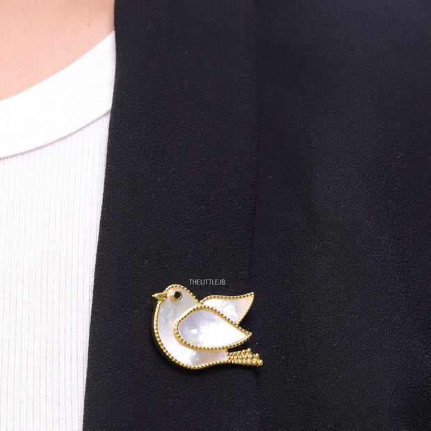 Gold plated white bird brooch