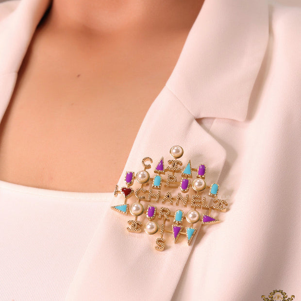 Multicoloured cz and pearls brooch in gold plating