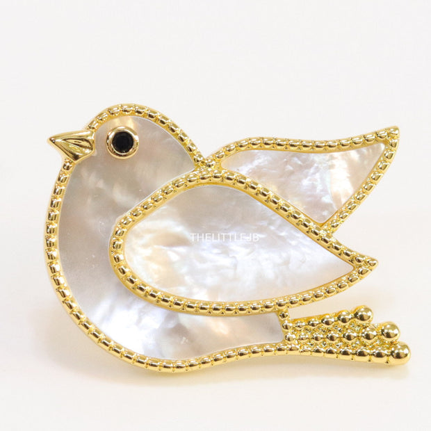 Gold plated white bird brooch