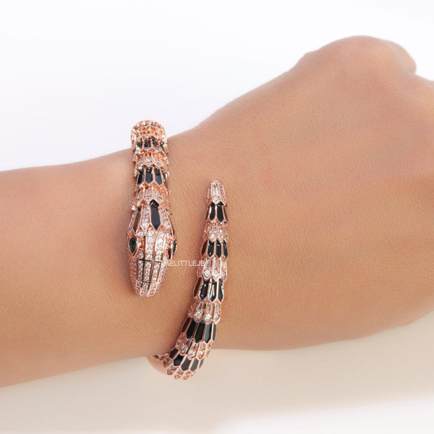 Top open serpentine black enamel bracelet with rose gold plating and cubic zirconia stones