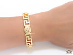 Gold plated designer bracelet with gold plated Medusa face motif