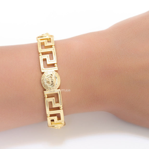 Gold plated designer bracelet with gold plated Medusa face motif