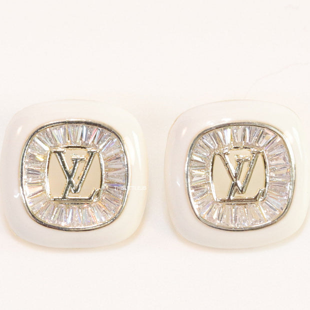 Golden and white square studs with alphabets and cz baguettes