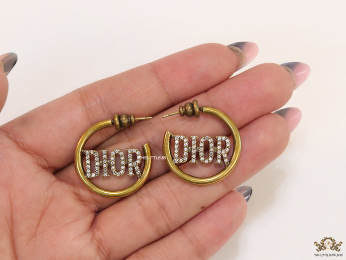 Open golden hoops with cz alphabets