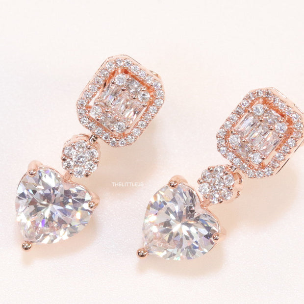 Rose gold Cz baguette earrings with heart shape cz drop