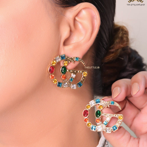 Double G golden earrings with multicolor cz stones
