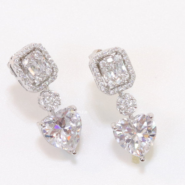 Cz baguette earrings in platinum with heart shape cz drop